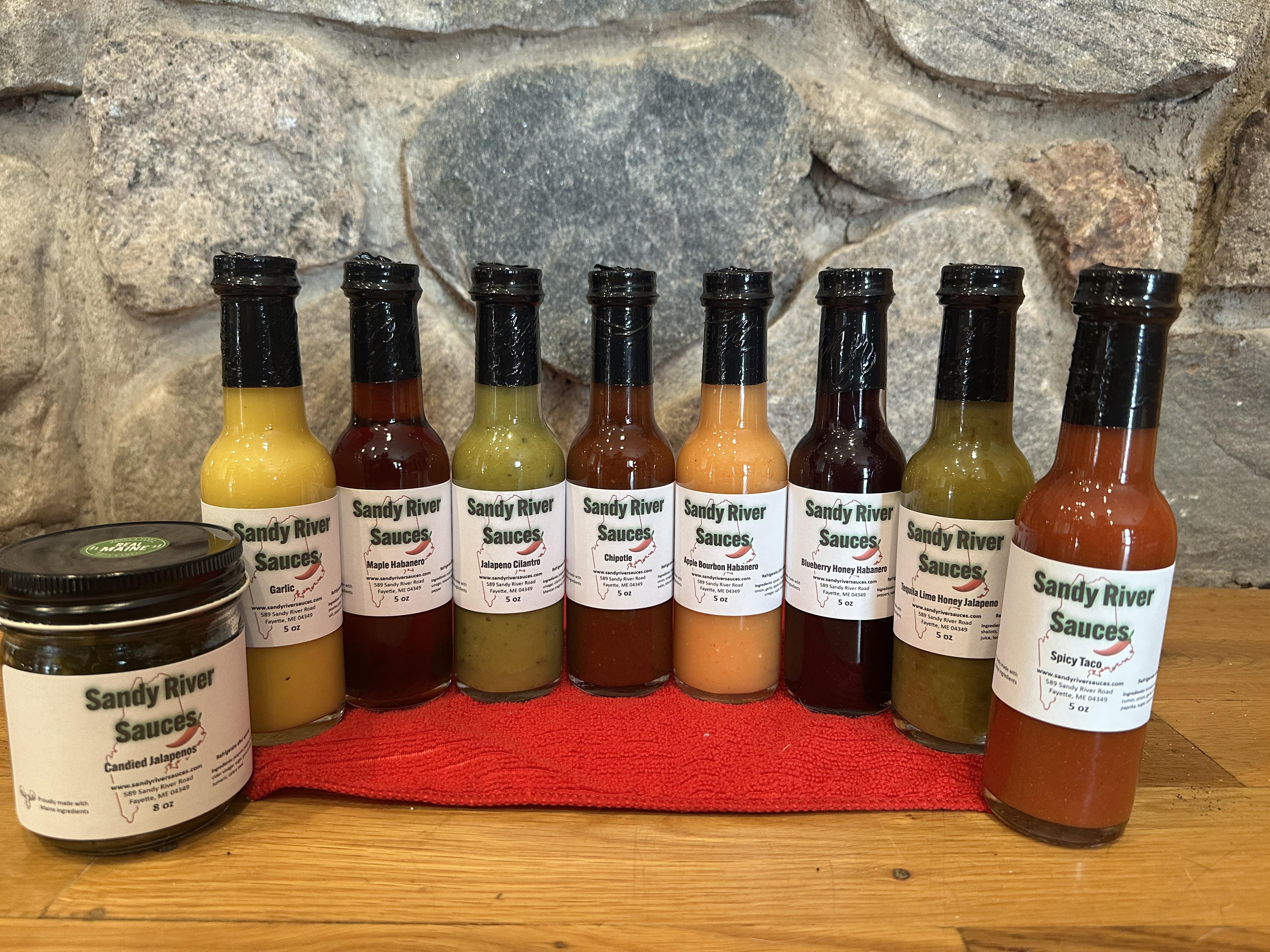 The full Sandy River Sauces lineup — nine handmade sauces from Maine